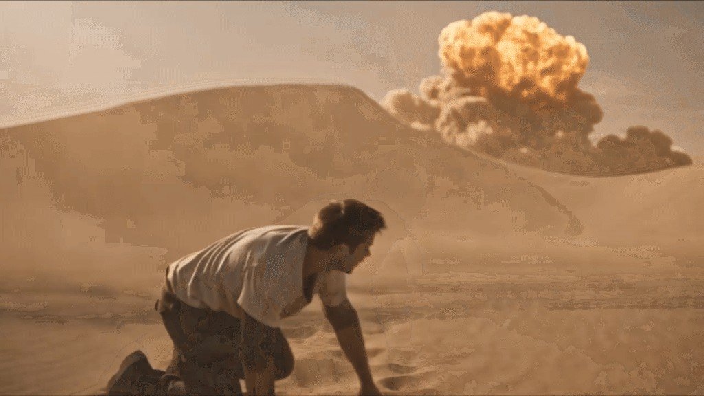 Image de la bande-annonce de l’école IDALL AI : un homme dans le désert devant une explosion